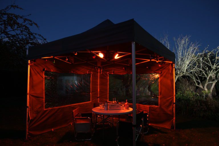 walled gazebo at night